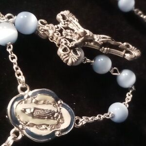 Cross rosery Jesus on the cross & mother teresa done in blue enamel .